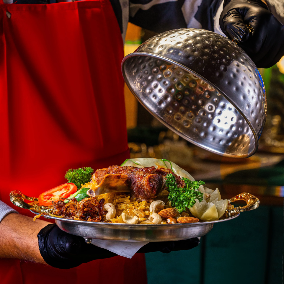 Mutton Mandi – tender, slow-cooked meat with aromatic rice.